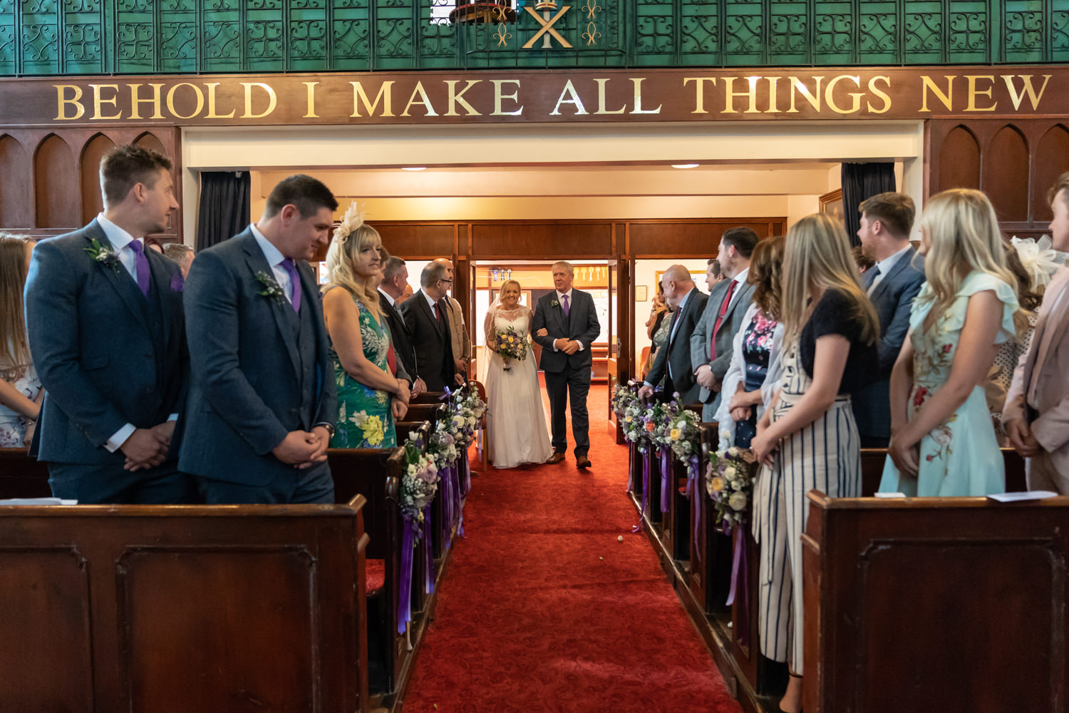 Bride walking down the aisle with her father