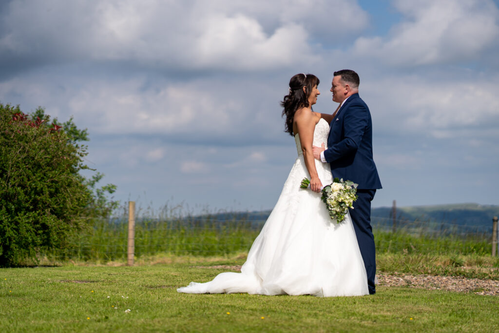 Bride and groom at the Huntsman Inn, Holmfirth