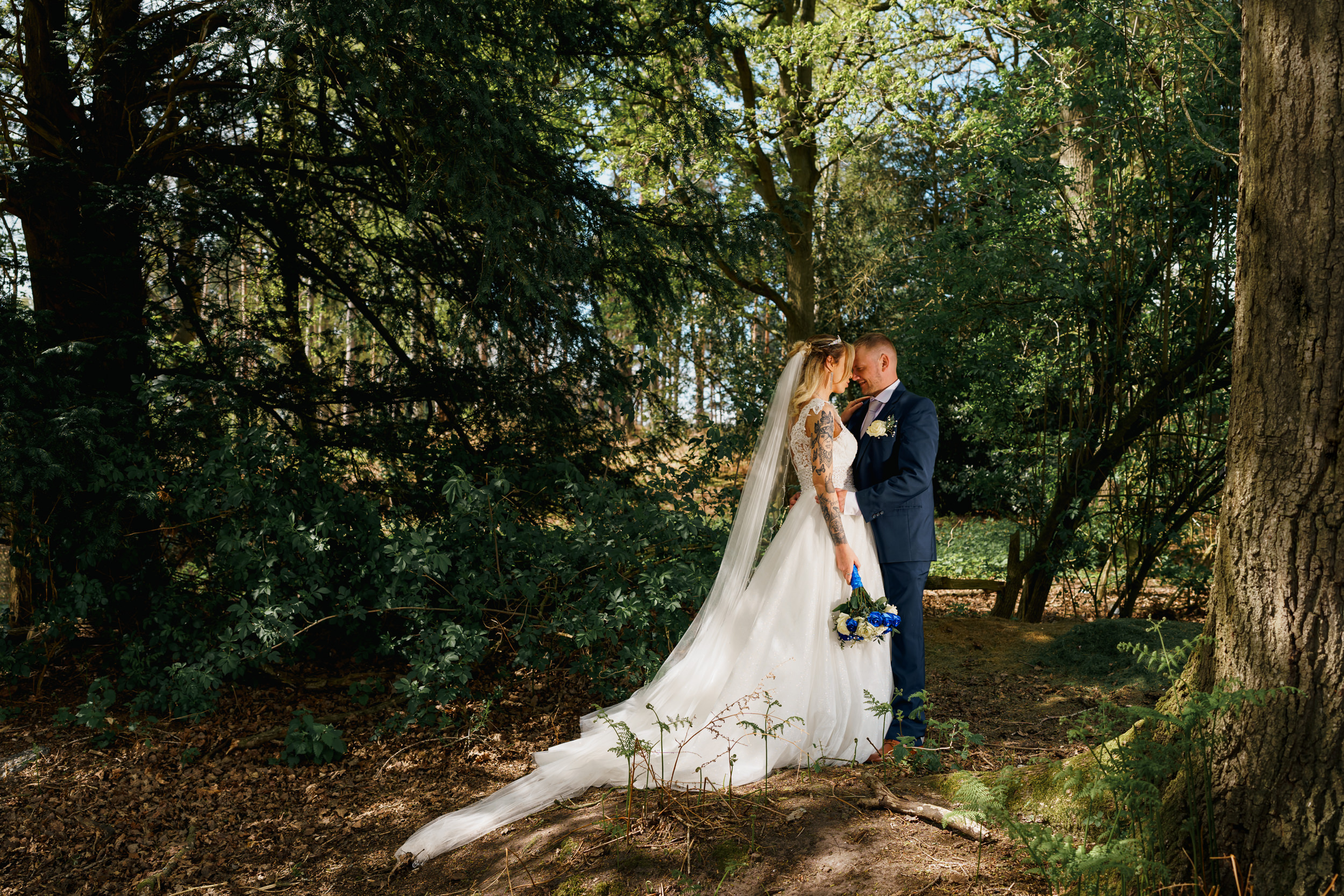 Bride and groom together outside Peckforton Castle.