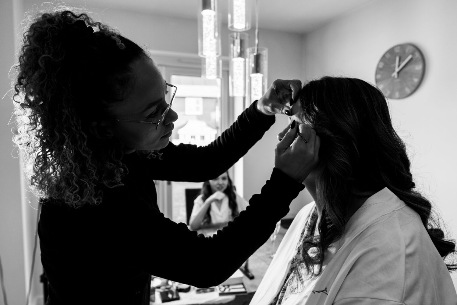 Bride having her makeup applied