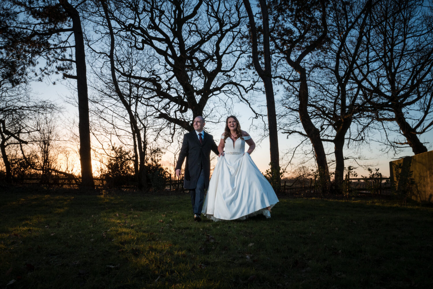 Bride and groom walking together at The Partridge