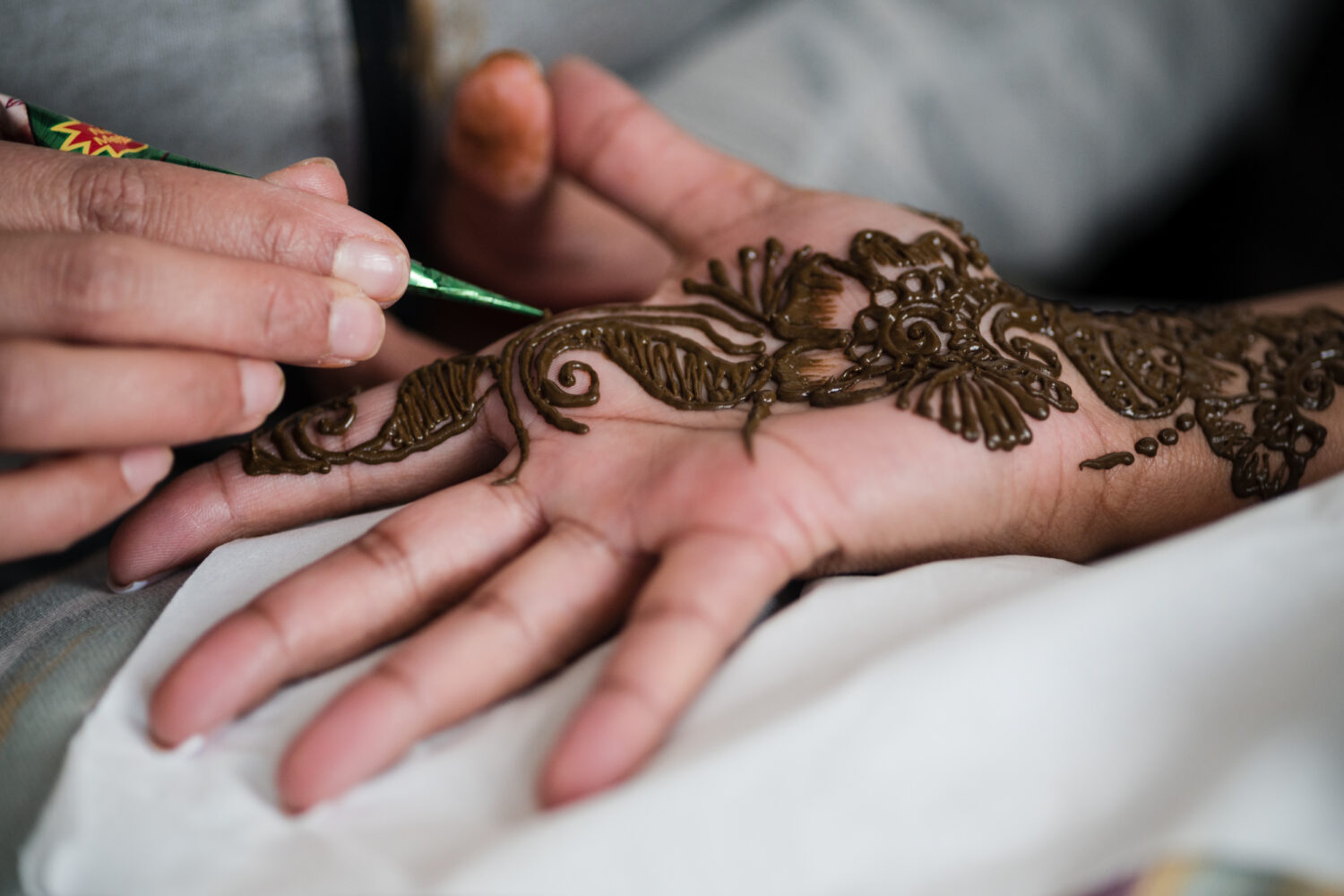 Close up of the henna being applied