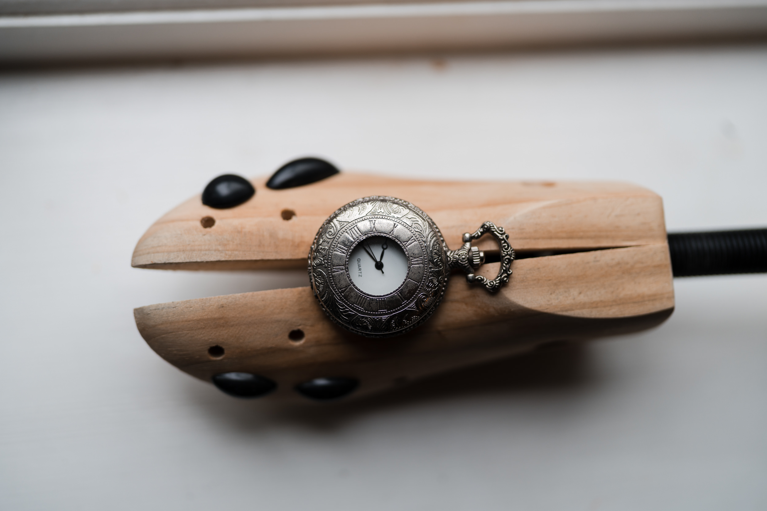Overview of the groom's  pocket-watch at the Stanneylands