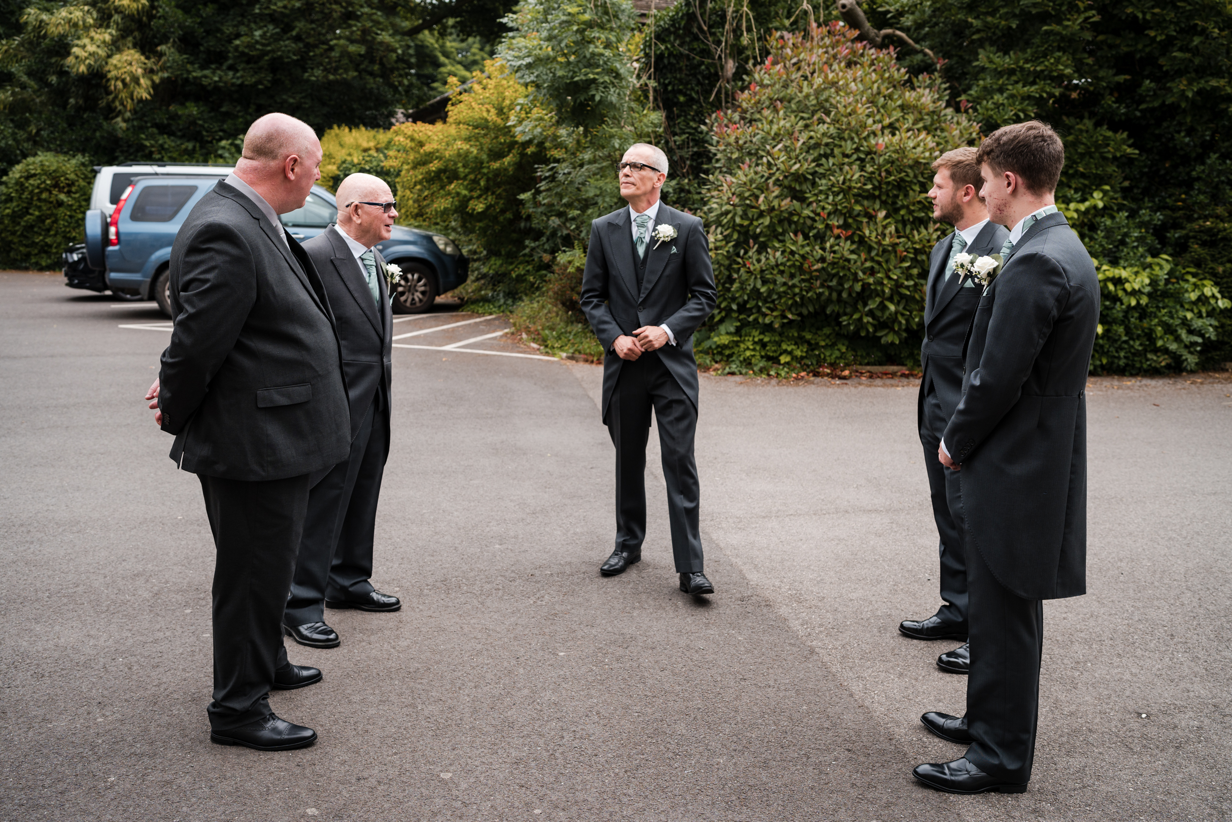 The groom's party getting some air outside