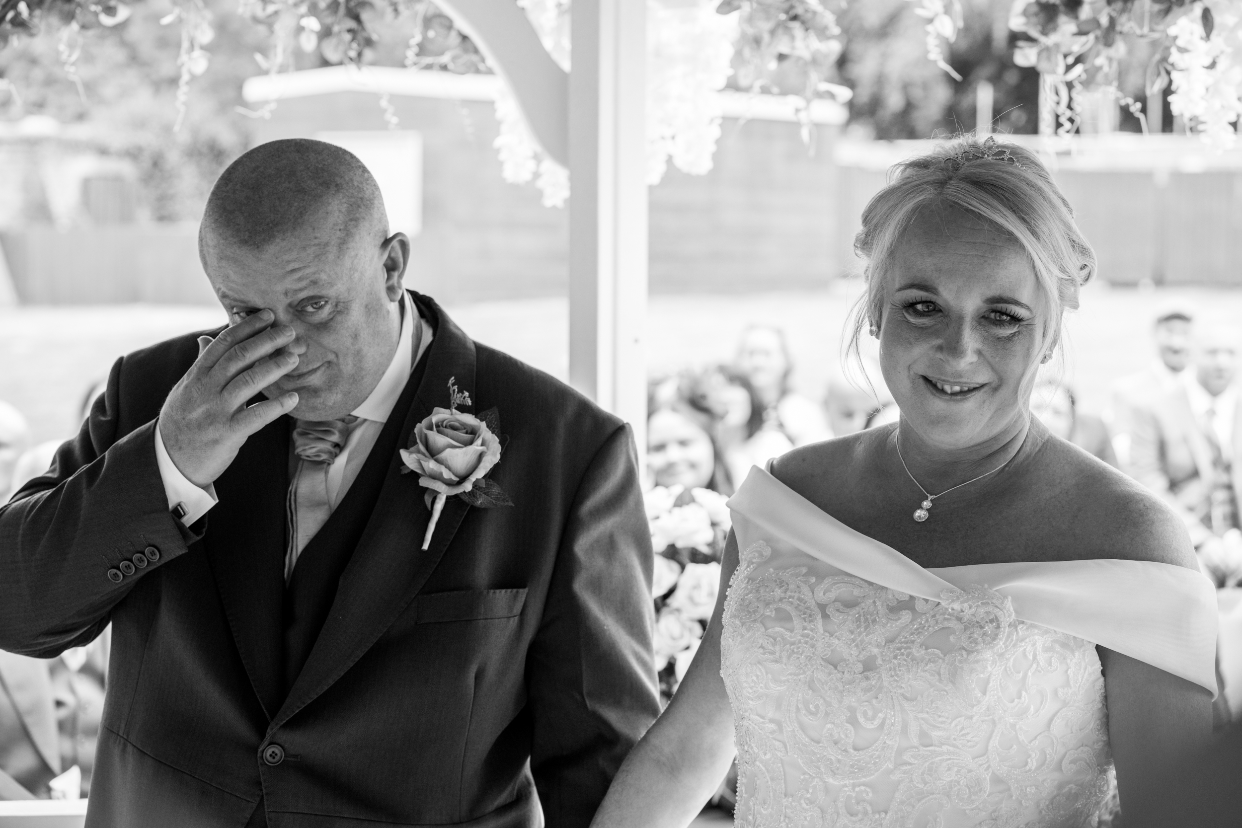 Groom drying his eye at Briars Hall Hotel