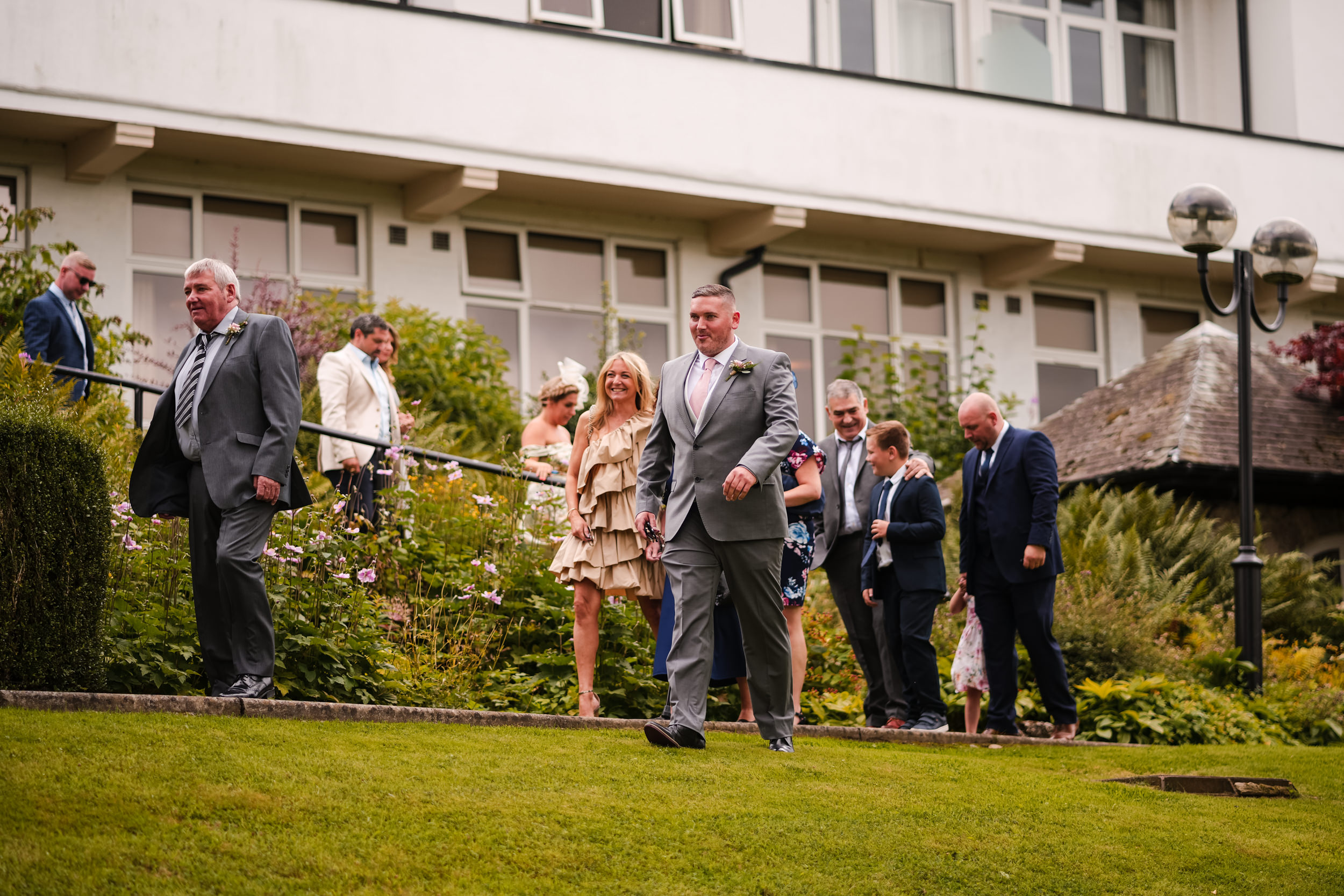 Guests making their way to the ceremony at Castle Green