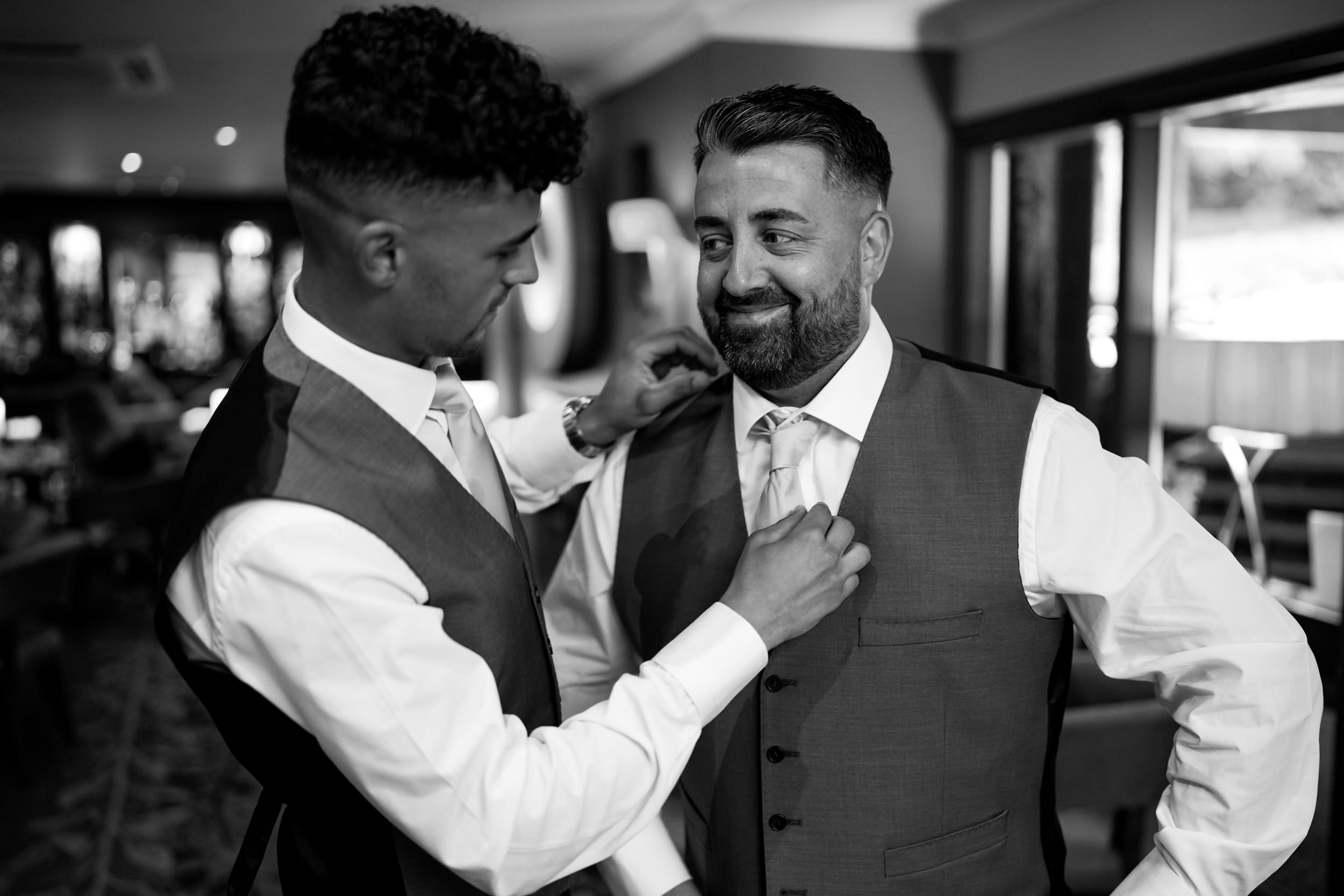 Getting the ties right in the bar at Castle Green.