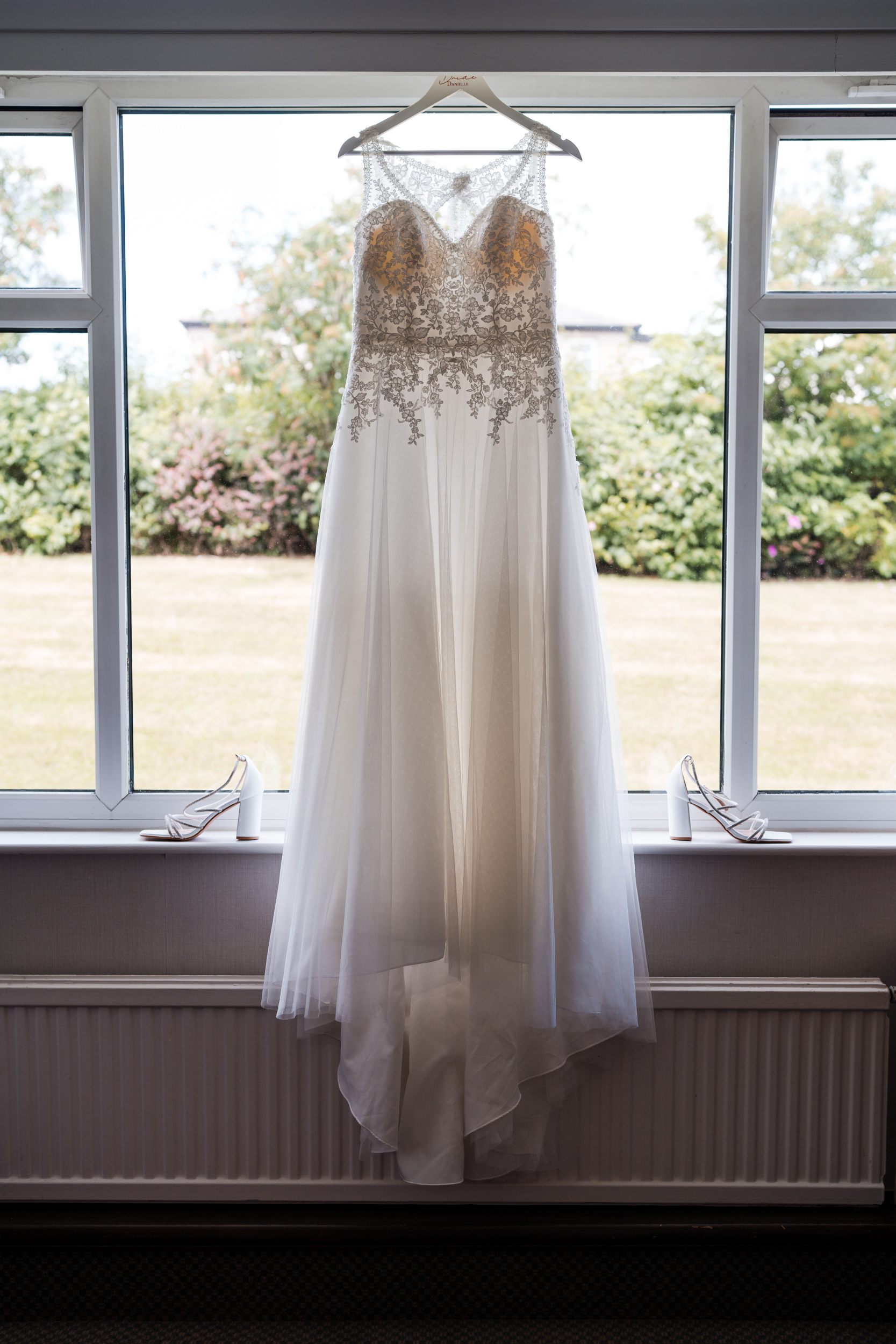 The bride's dress and shoes together. Cedar Court