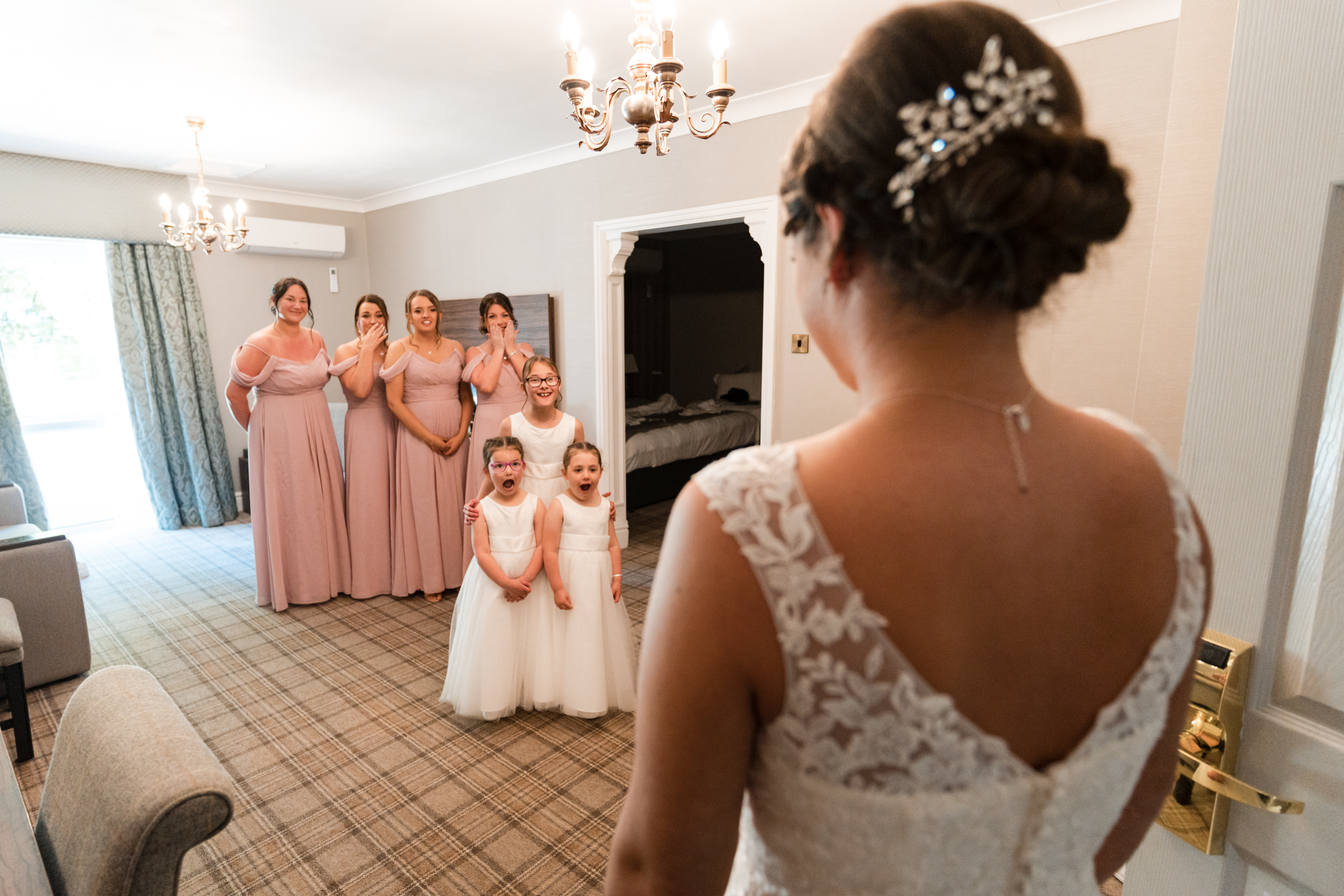 Bride's reveal to her bridal party at Norton Grange