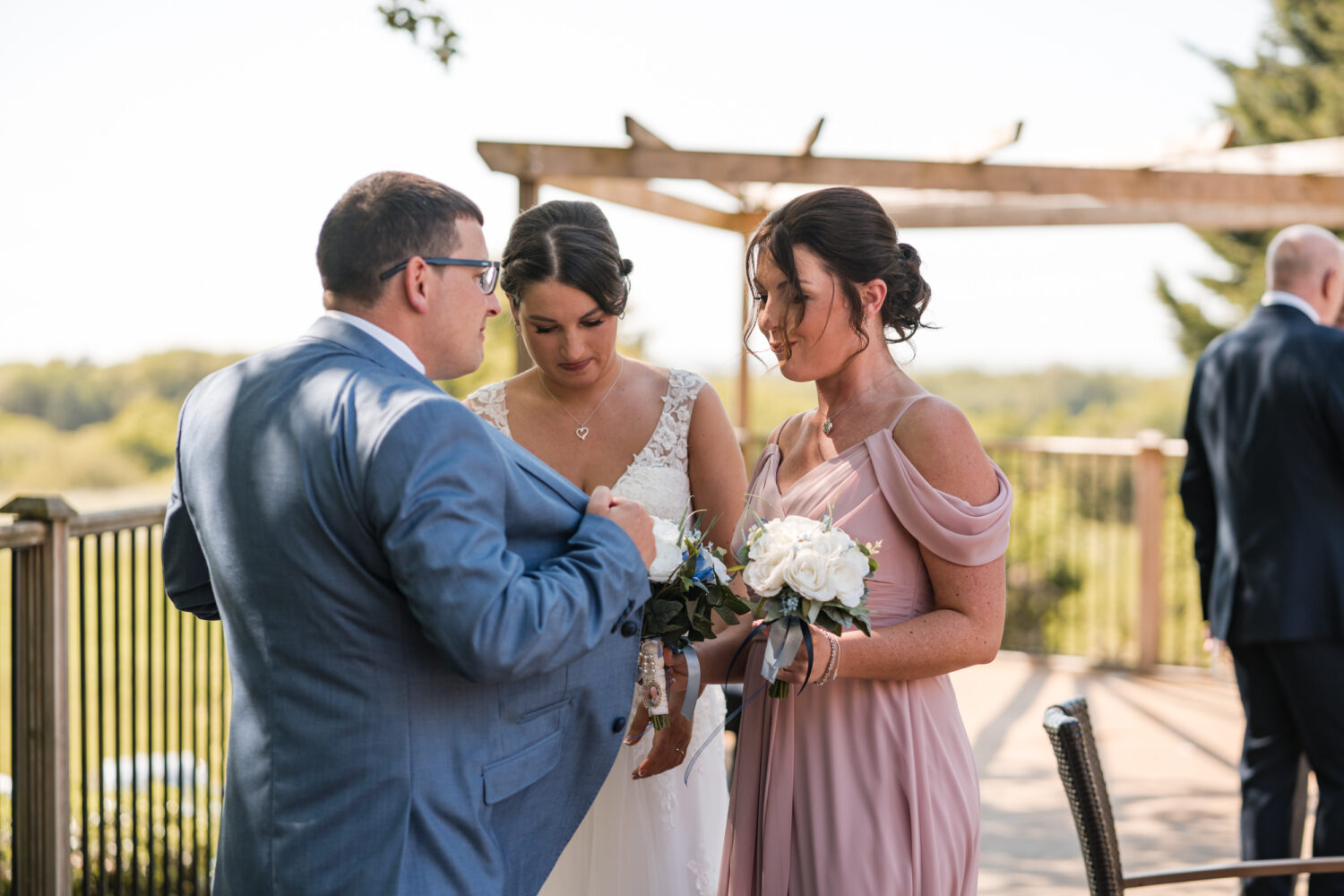 Groom with bride and daughter at Norton Grange Hotel