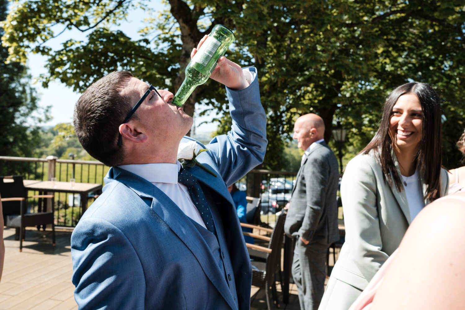 Groom having a drink at Norton Grange Hotel