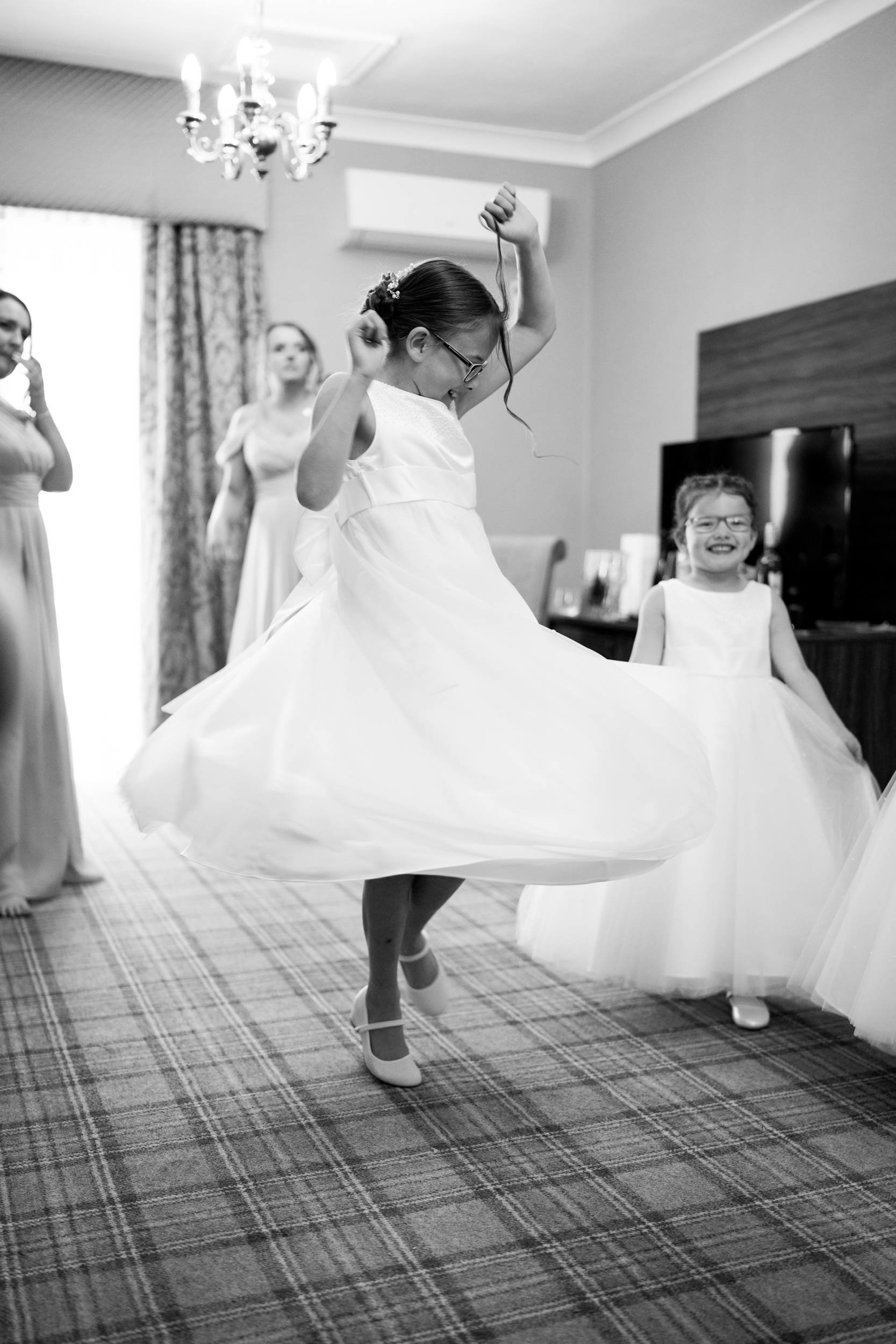 Flower girl twirling at Norton Grange