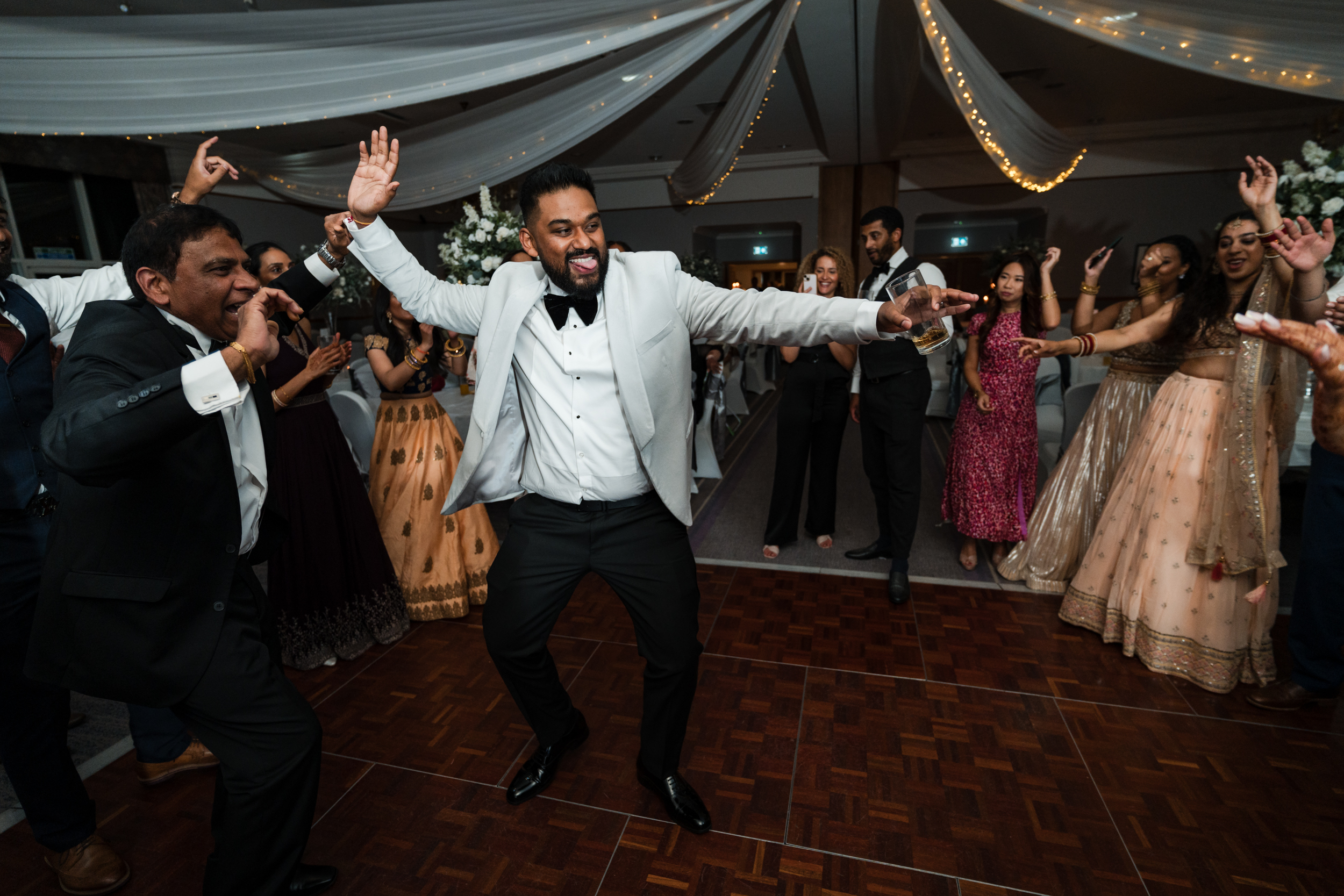 Groom dancing at his wedding