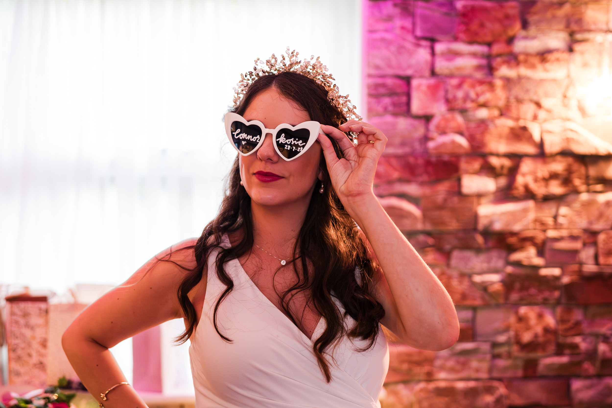 Bride wearing sunglasses at Grains Bar