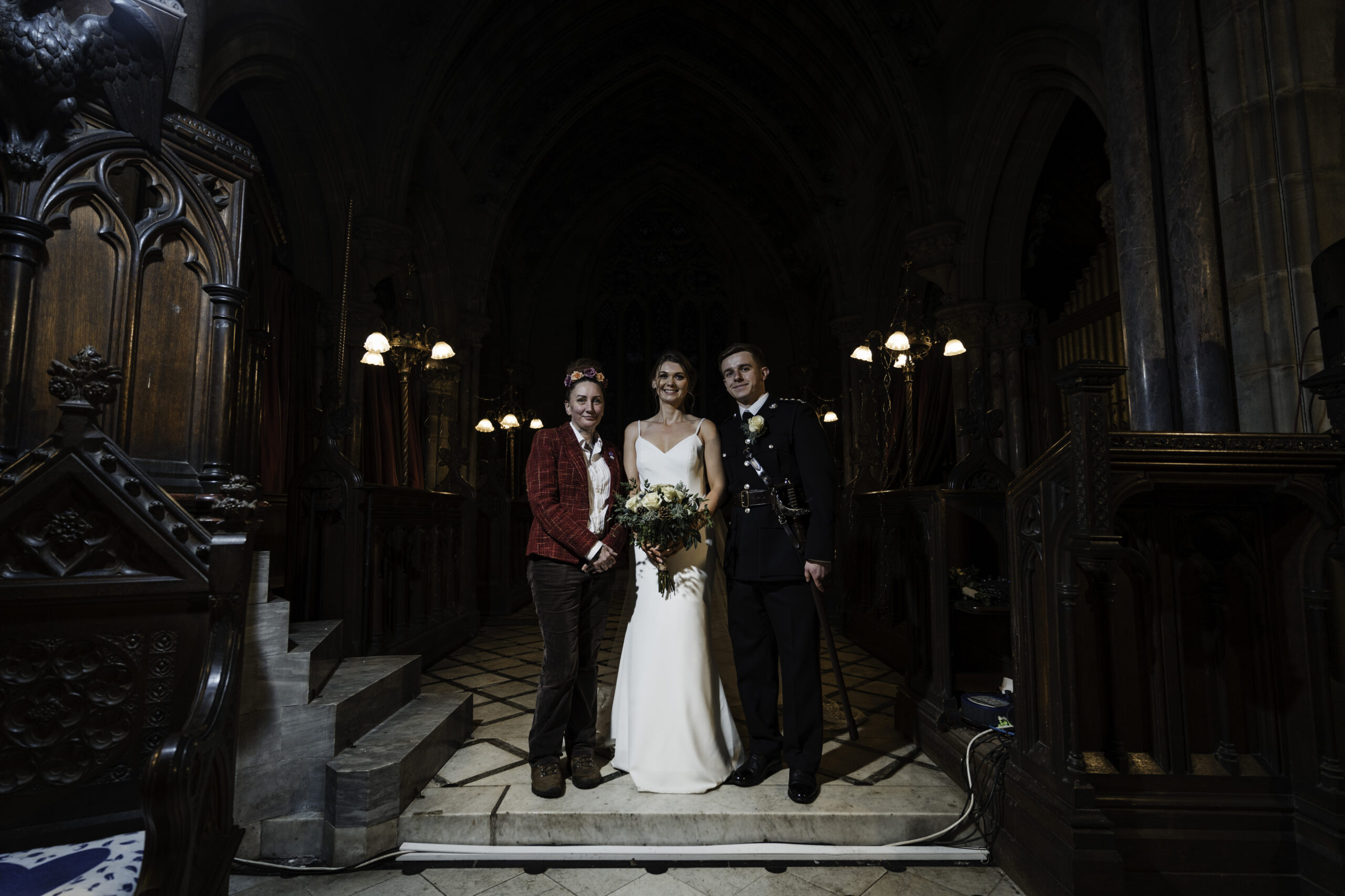 Couple posing with their registrar