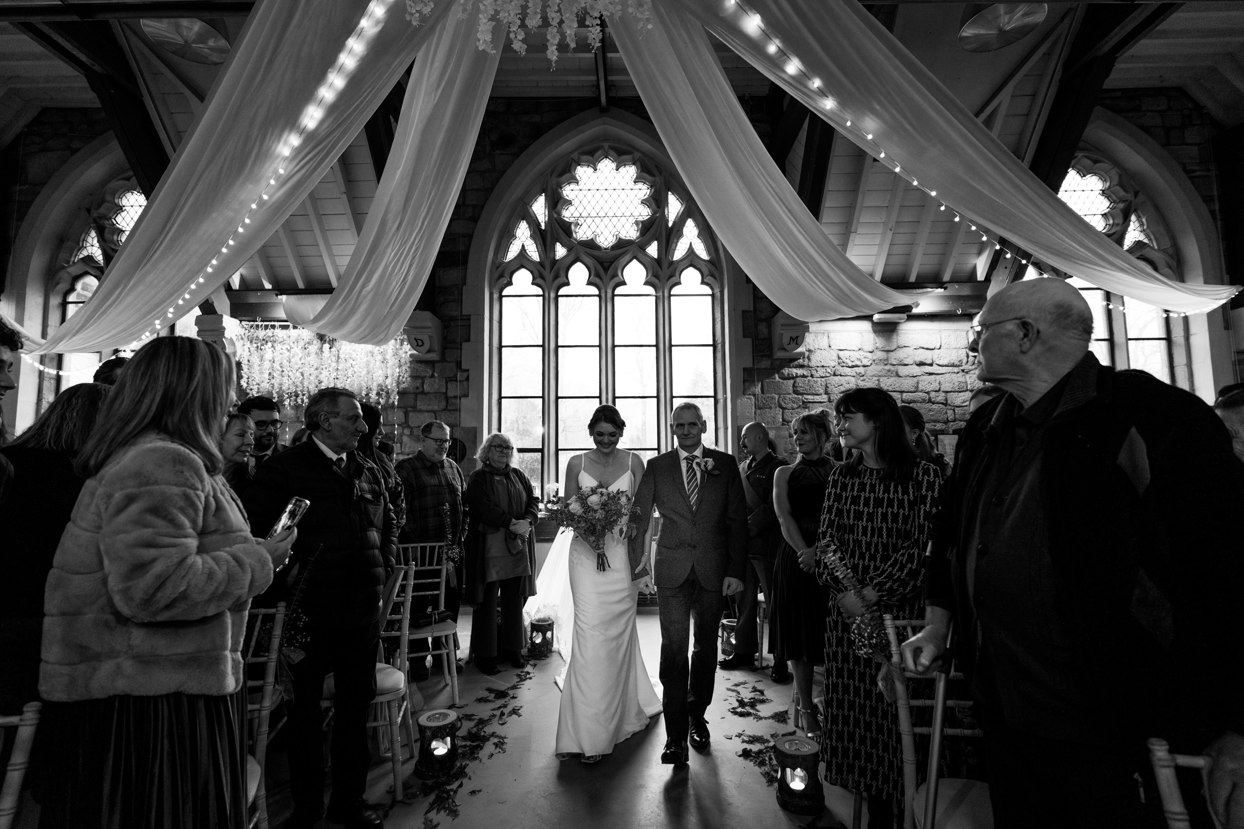 Bride walking down the aisle with her father