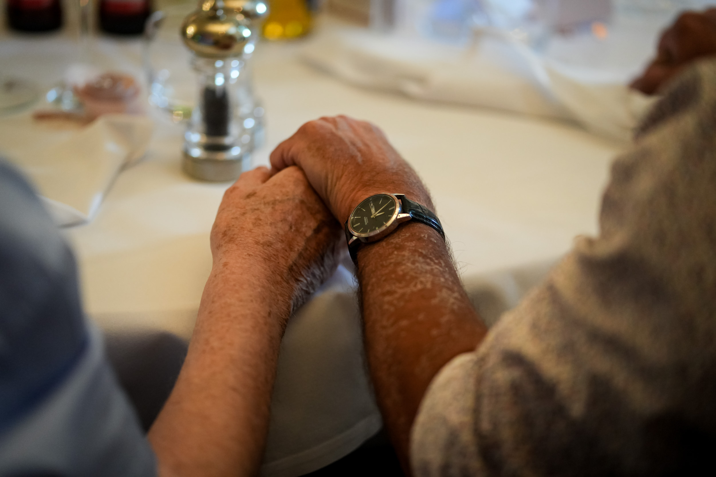 Couple holding hands