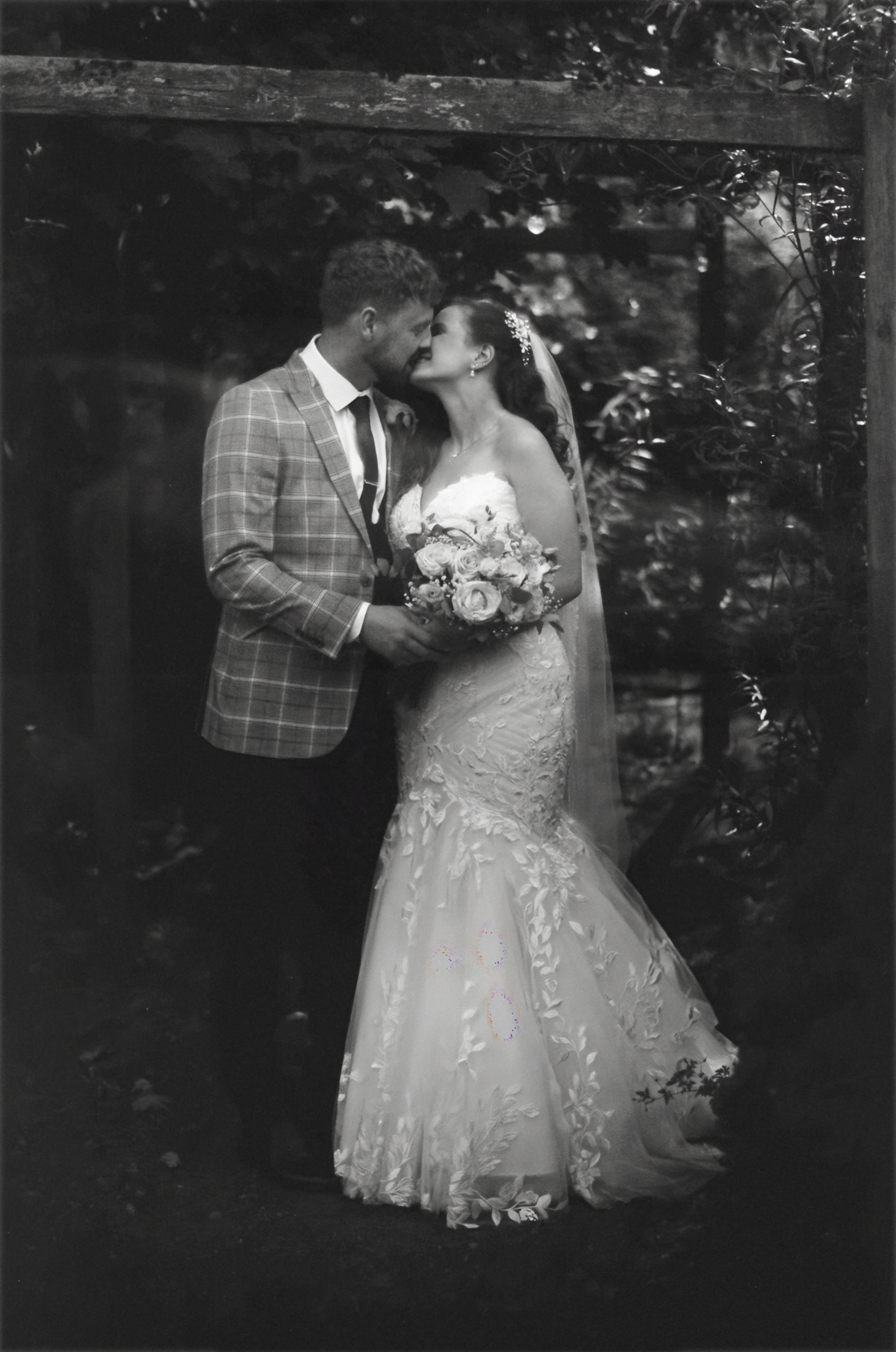 Film portrait of the couple at Grains Bar