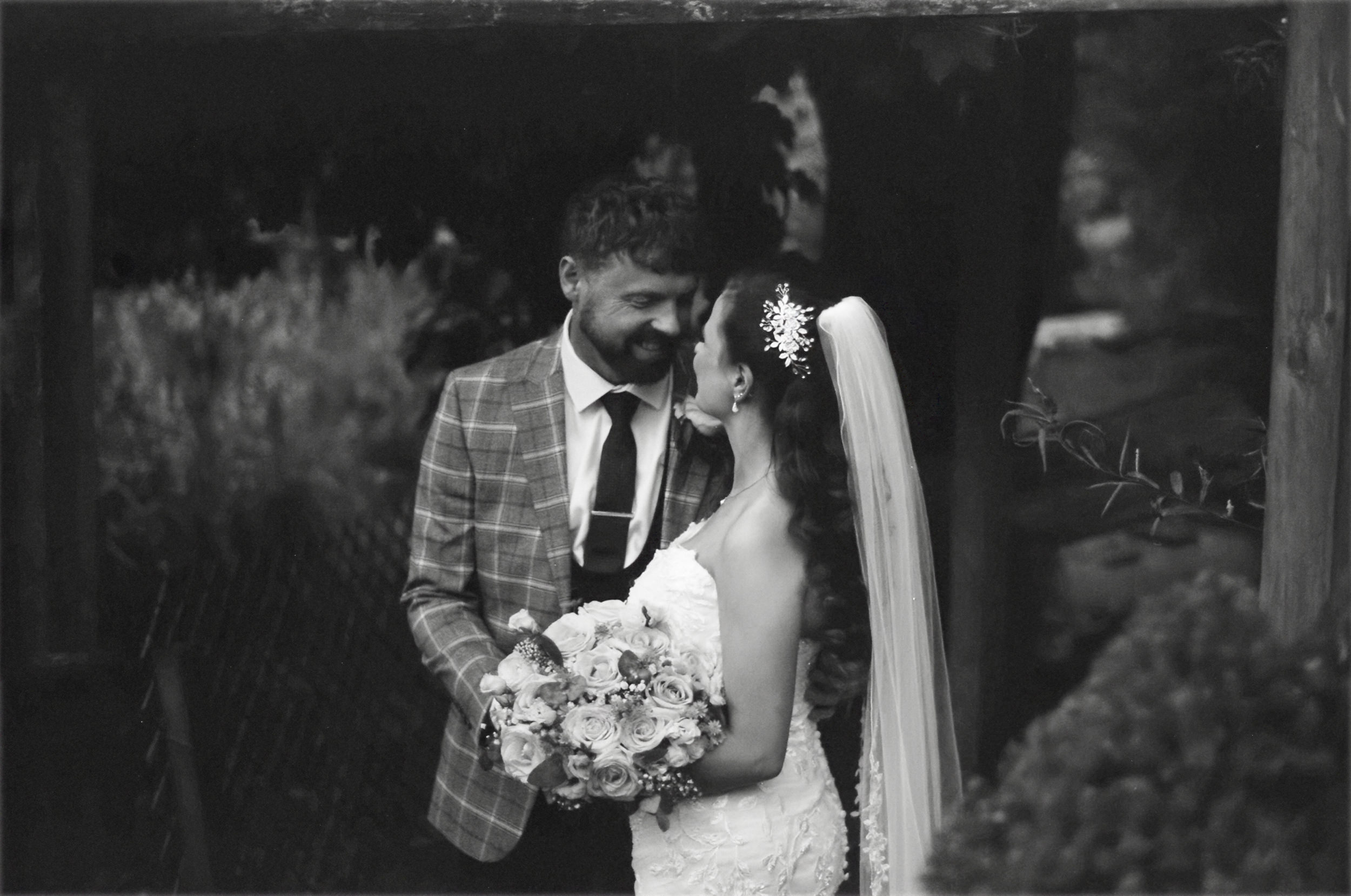 Film photo of the bride and groom at Grains Bar