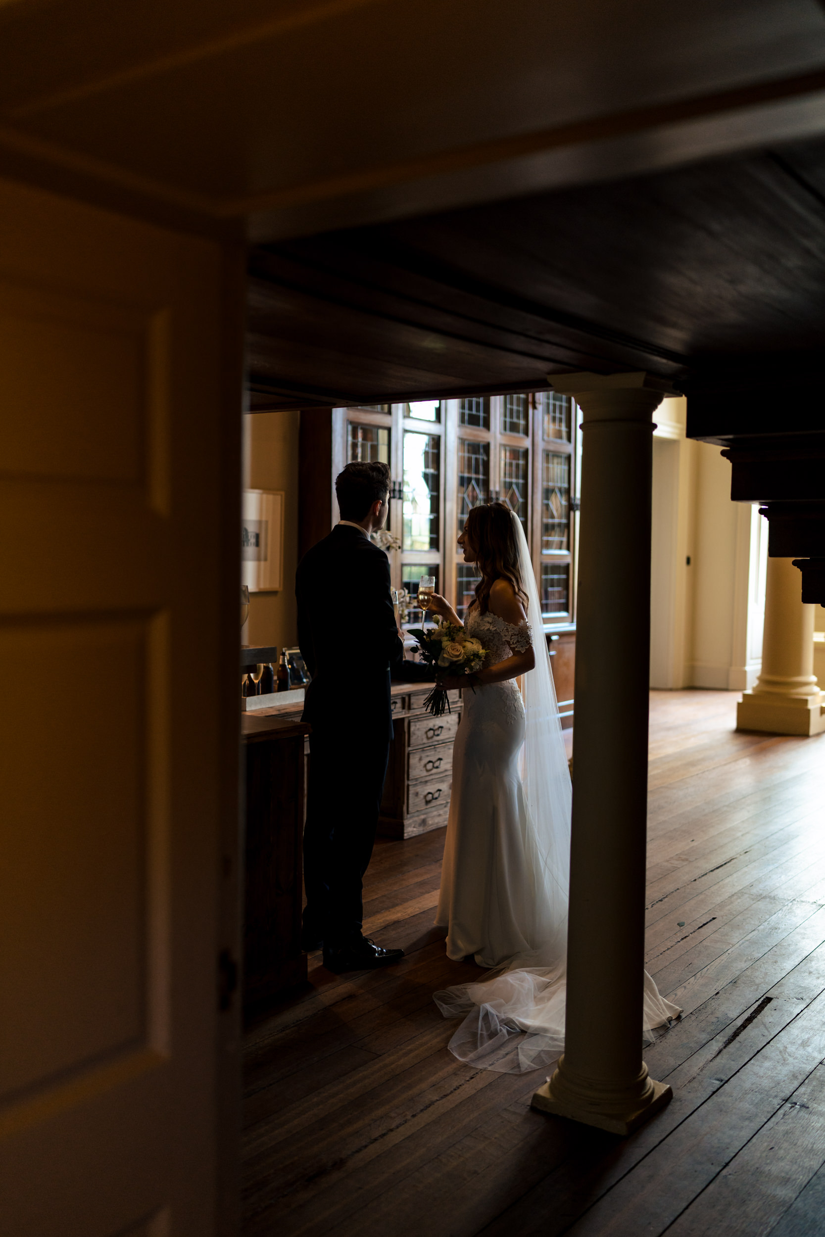 The bride and groom having a private moment together at Howsham Hall