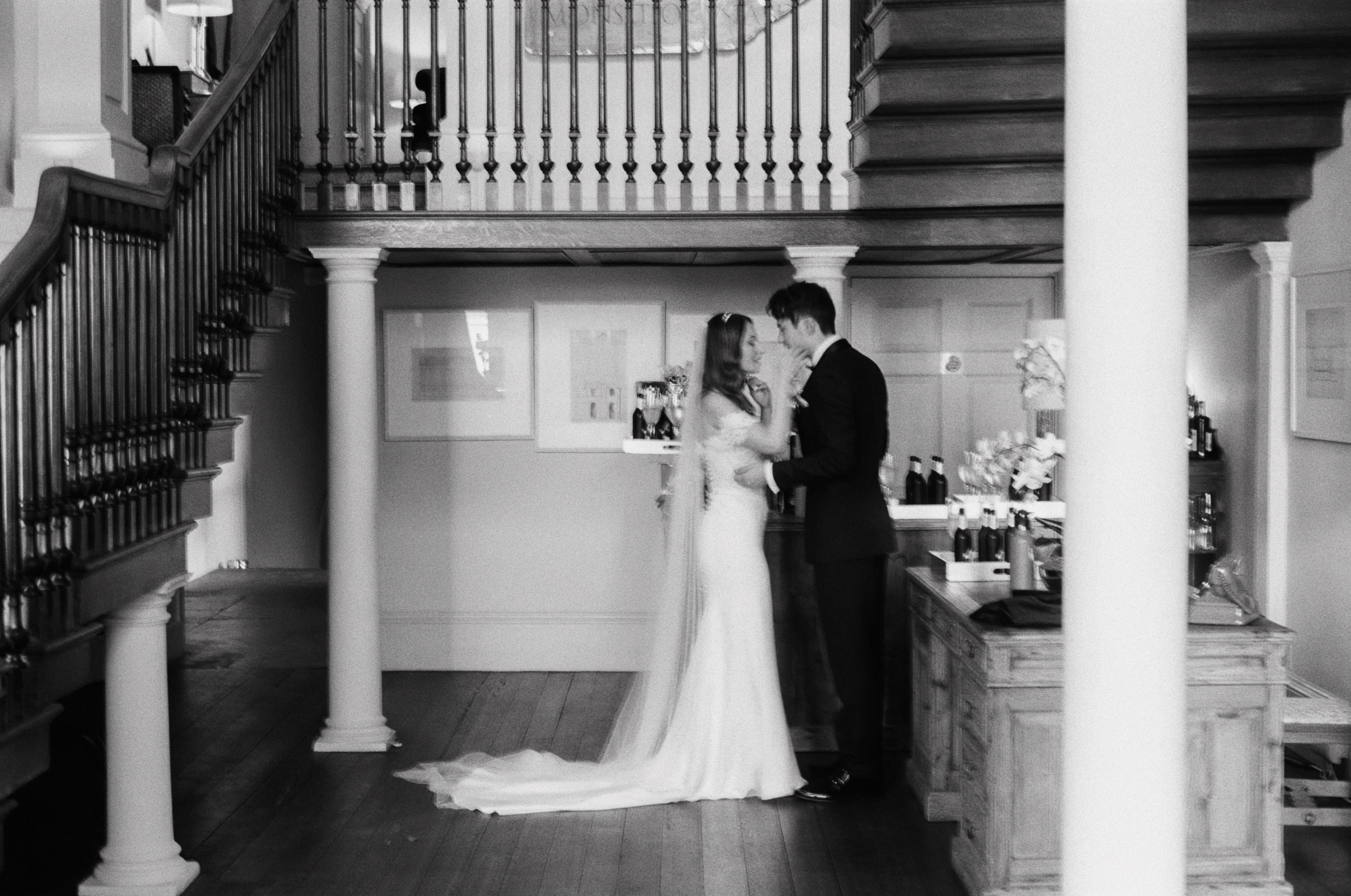 Film photograph of The bride and groom having a private moment together at Howsham Hall