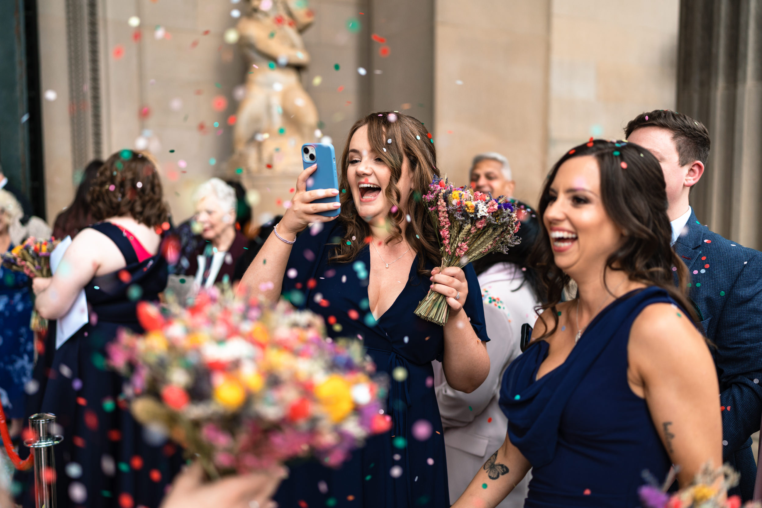 Guests enjoying the aftermath of the confetti