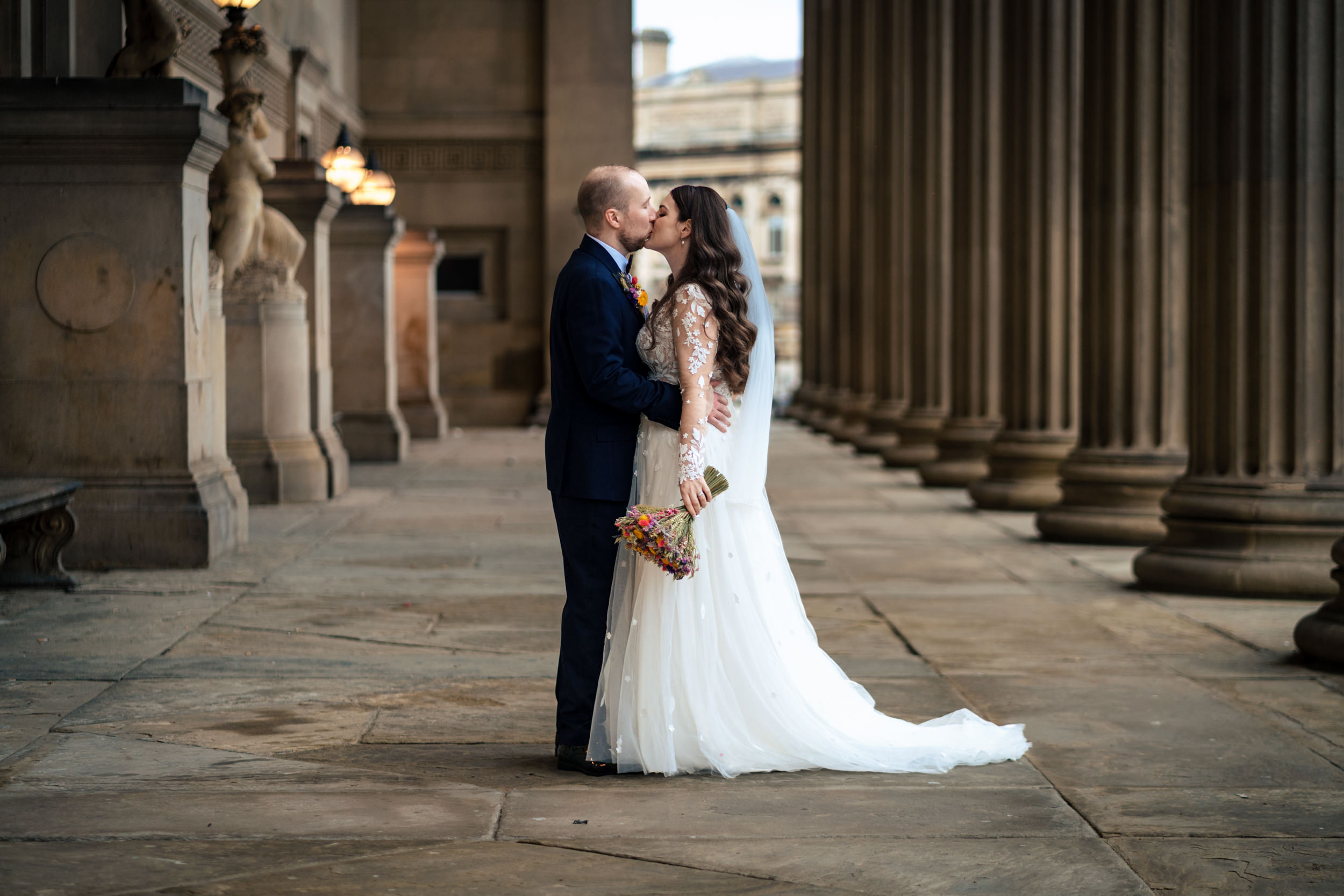Bride and groom outside St George's Hall in Liverpool